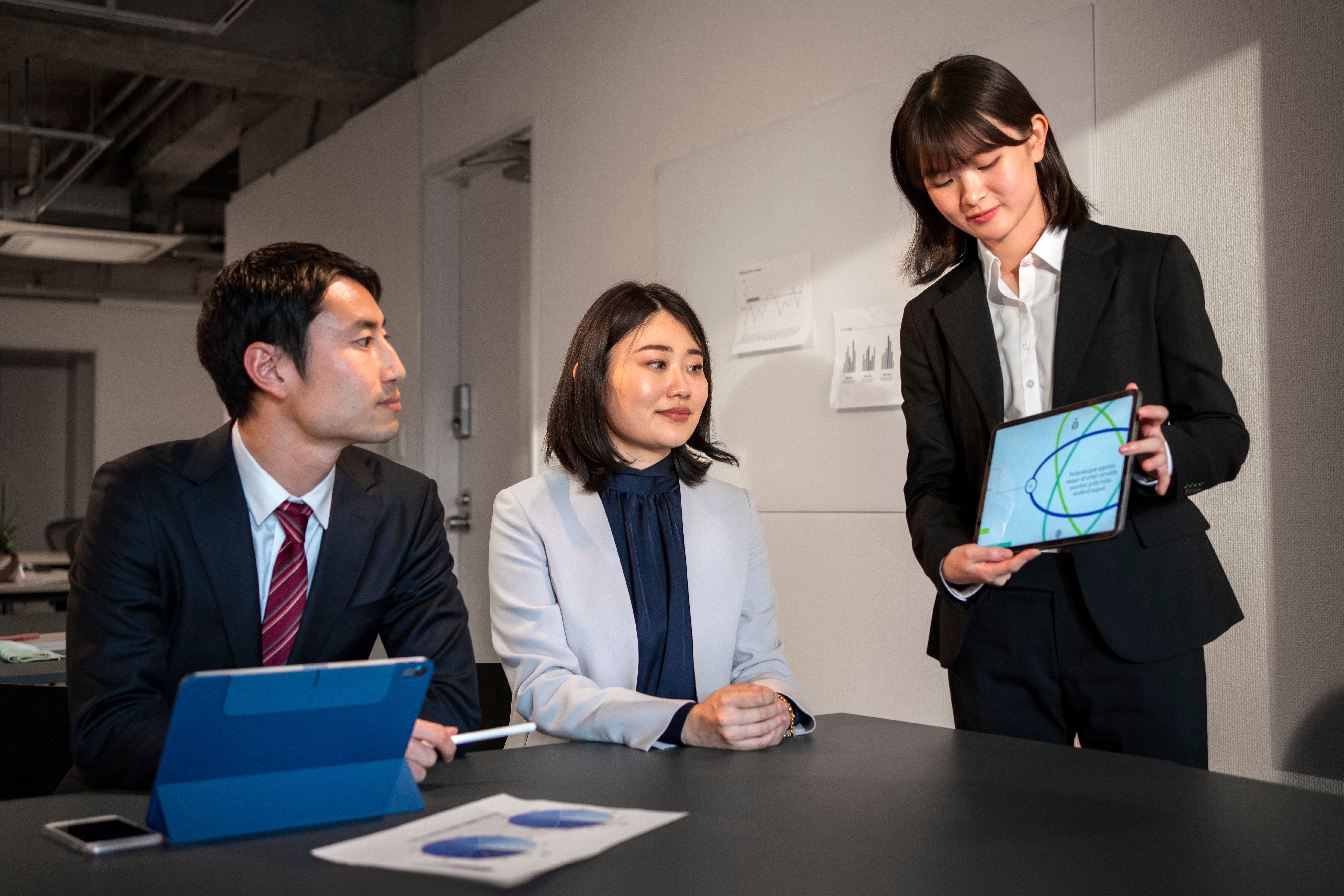 business-people-working-with-ipad-front-view