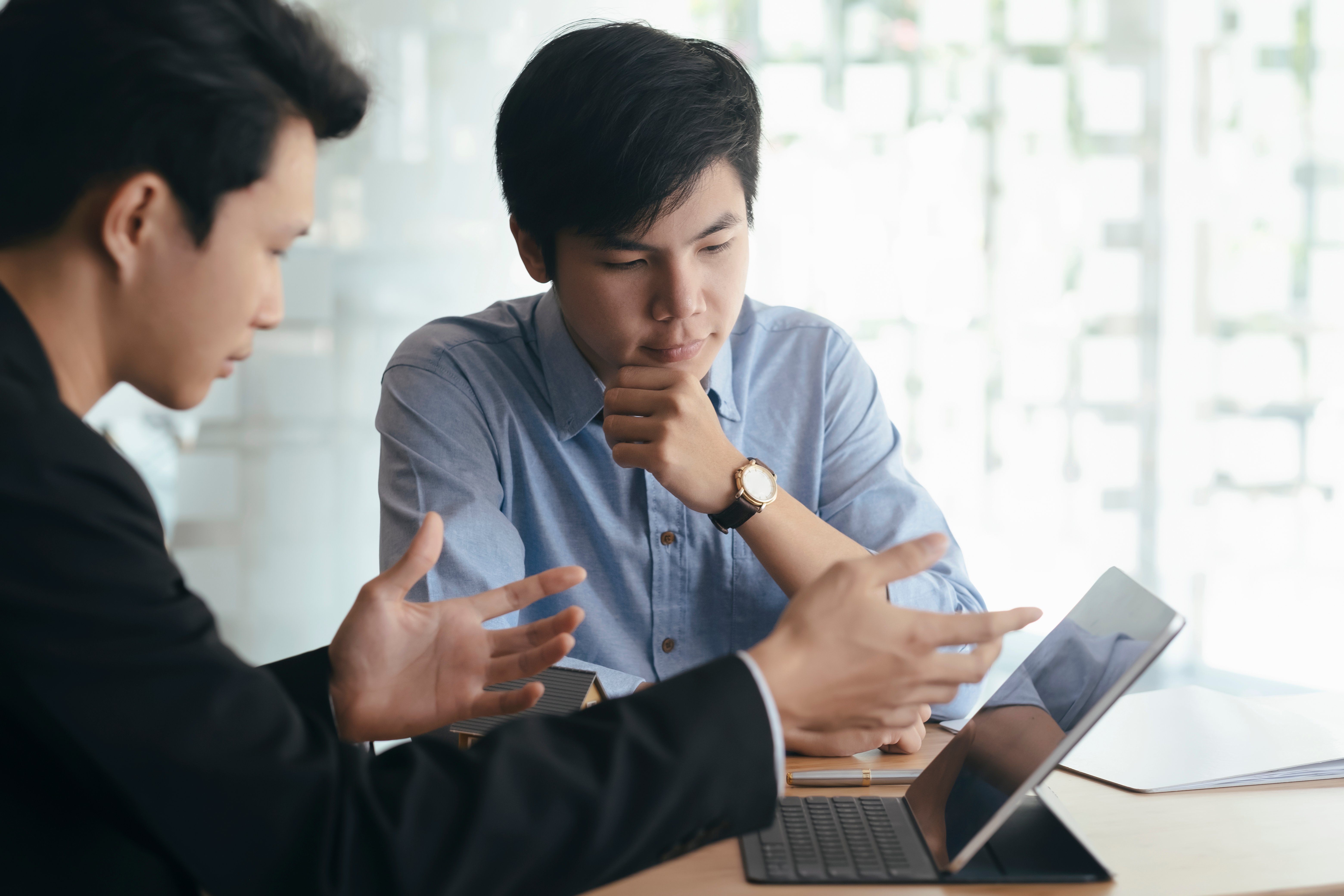 businessmen-teamwork-discussing-investment